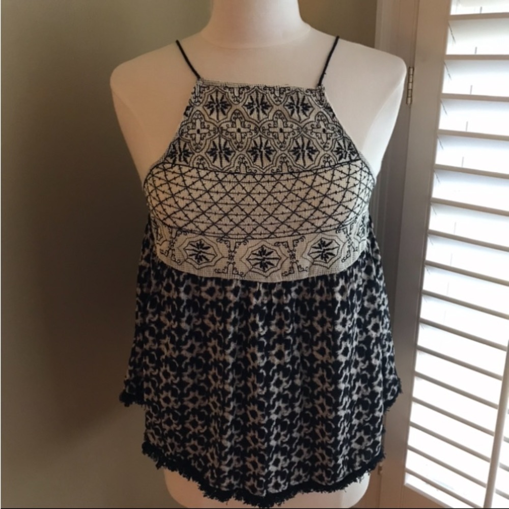 NWT Alter’d state fun black and white tank. It has a fringe around the bottom.